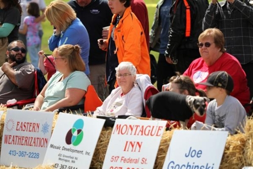 photo of lawn signs and spectators